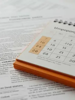 Unemployment benefits documents with January 2026 calendar marking new eligibility rules