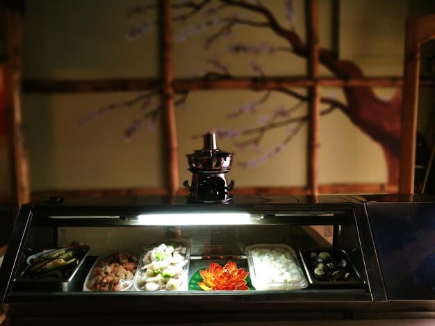 An image showing the interior of a modern Korean restaurant in the US, filled with American diners enjoying a variety of Korean dishes. The atmosphere is vibrant and welcoming, reflecting the increasing popularity of Korean cuisine.
