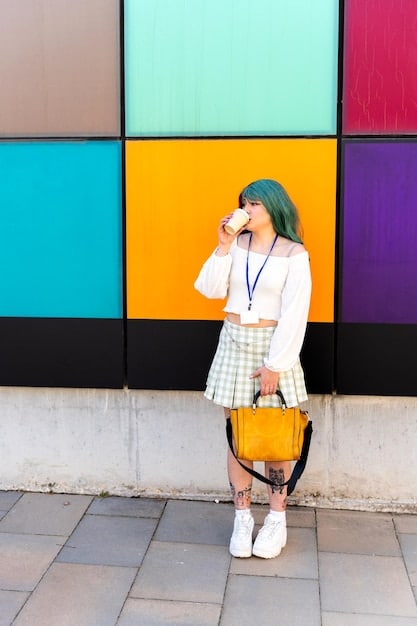 A woman carrying a statement bag with a unique design and bold color. She is wearing a stylish outfit inspired by K-drama fashion and walking down a city street.