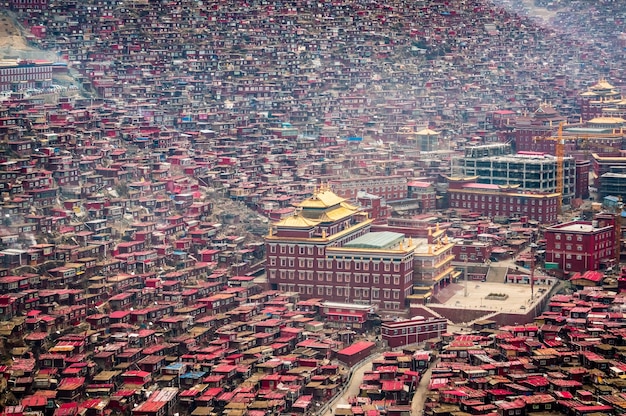 A panoramic shot of the Forbidden City in Beijing, densely crowded with tourists, emphasizing its historical significance and popularity as a filming spot in numerous Chinese historical dramas.