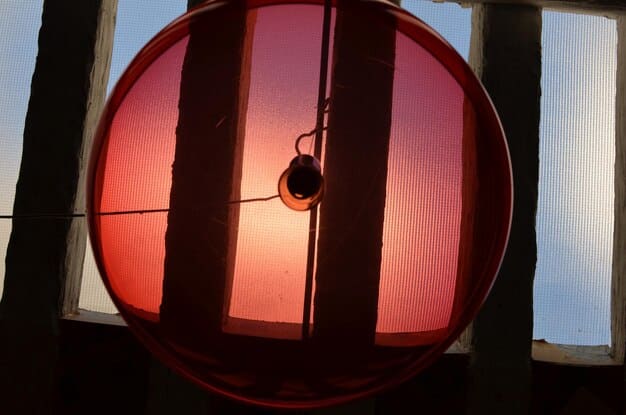 A close-up shot of a vinyl record playing a Japanese drama OST, with the needle gently touching the surface. The album cover should be partially visible, showcasing a popular J-drama title. Soft, warm lighting should create a nostalgic and inviting atmosphere.