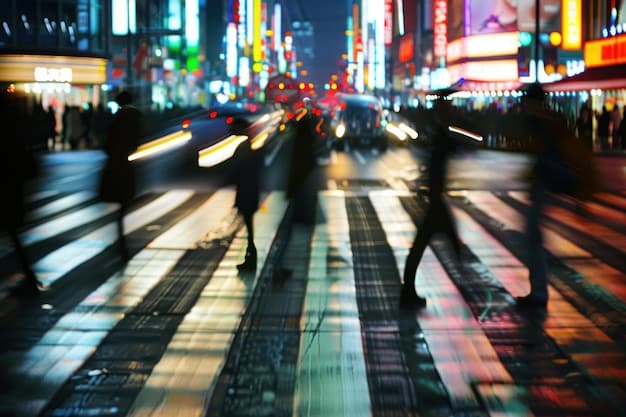 A panoramic view of Shibuya Crossing at night. The neon lights are dazzling, illuminating the crowds of people crossing the intersection. The iconic scramble crossing is a swirl of motion.