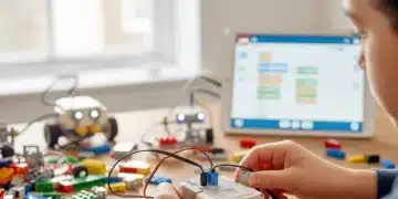 Child assembling Lego Boost robot with coding interface on tablet