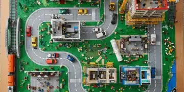 Crafting Your Lego City Layout: 2025 Expert Guide Detailed Lego City layout under construction with hands placing a piece