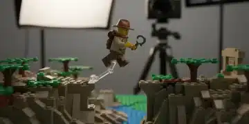 Create LEGO Stop Motion Animation: Your Ultimate Guide Lego minifigure poised for stop motion animation on a colorful baseplate