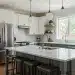 Modern renovated kitchen with stainless steel appliances and quartz countertops increasing home resale value